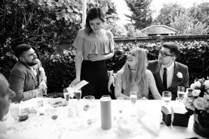 Emotional speech by daughter of the bride at garden wedding in Winchmore Hl